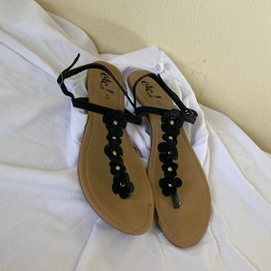 Rue21 Sandals with black flower details. Size 10